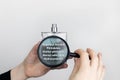 A woman examines the harmful ingredients of the perfume through a magnifying glass. Means with isopropyl alcohol, phthalates, Royalty Free Stock Photo