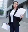 Woman is examining documents