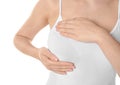 Woman examining her breast on white background, closeup. Cancer awareness concept Royalty Free Stock Photo