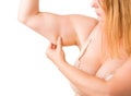 Woman with excess fat on arm Royalty Free Stock Photo