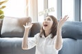 Woman excited with money dollar banknote rain fall. Happy start up business woman got winner lucky draw reward rich millionaire