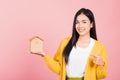 Woman excited smiling holding house model on hand Royalty Free Stock Photo