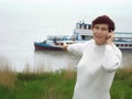 Woman and excursion ship. Royalty Free Stock Photo