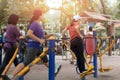 Woman exercise in the park with exercise equipment
