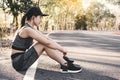 Woman exercise and rest on road Royalty Free Stock Photo