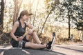 Woman exercise and rest on road Royalty Free Stock Photo