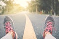 Woman exercise and rest on road Royalty Free Stock Photo