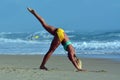 Woman exercise Yoga on the beach