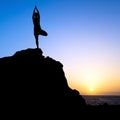 Woman exercise yoga tree sunset silhouette Royalty Free Stock Photo