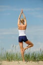 Woman exercising on beach Royalty Free Stock Photo