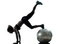 Woman exercising fitness ball workout