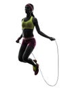 Woman exercising fitness jumping rope silhouette Royalty Free Stock Photo