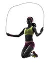 Woman exercising fitness jumping rope silhouette Royalty Free Stock Photo