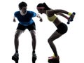 Woman exercising fitness weight training with man coach