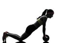 woman exercising fitness workout abdominal toning wheel silhouette Royalty Free Stock Photo