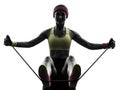 Woman exercising fitness workout resistance bands silhouette Royalty Free Stock Photo