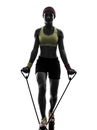 Woman exercising fitness workout resistance bands silhouette Royalty Free Stock Photo