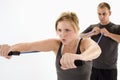 Woman exercising with personal trainer