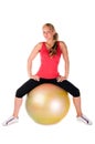 Woman exercising with a pilates ball Royalty Free Stock Photo