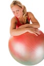 Woman exercising with a pilates ball Royalty Free Stock Photo