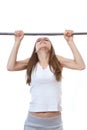Woman exercising on pull-up bar Royalty Free Stock Photo