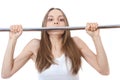 Woman exercising on pull-up bar Royalty Free Stock Photo