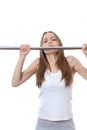Woman exercising on pull-up bar Royalty Free Stock Photo