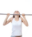 Woman exercising on pull-up bar Royalty Free Stock Photo