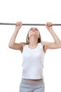 Woman exercising on pull-up bar Royalty Free Stock Photo