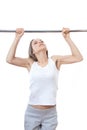 Woman exercising on pull-up bar Royalty Free Stock Photo