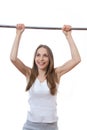 Woman exercising on pull-up bar Royalty Free Stock Photo