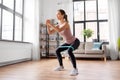 Woman exercising with resistance band at home Royalty Free Stock Photo