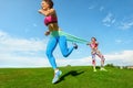 Woman exercising resistance rubber band