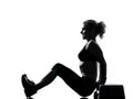Woman exercising step aerobics Royalty Free Stock Photo