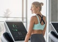 Woman exercising on treadmill in sport club Royalty Free Stock Photo