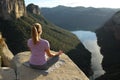 Woman exercising yoga meditating in the mountain Royalty Free Stock Photo