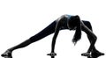 Woman exercising yoga stretching legs warm up silhouette Royalty Free Stock Photo