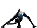Woman exercising yoga stretching legs warm up silhouette Royalty Free Stock Photo