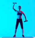 Woman exercsing weights fitness exercices isolated
