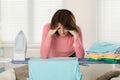 Woman Exhausted While Ironing Clothes Royalty Free Stock Photo