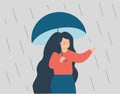 Woman experiences anxiety and intends to step out of her comfort zone. Young teenage girl protects herself from the rain.