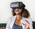 Woman experiencing the virtual reality goggles technology