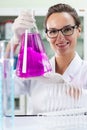 Woman experimenting in laboratory