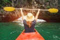 Woman explore Ha Long Bay on kayak Royalty Free Stock Photo