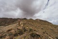 Woman explorer takes photos of the great volcanic landscape of Nevado de Toluca