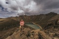 Woman explorer takes photos of the great volcanic landscape of Nevado de Toluca