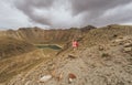 Woman explorer takes photos of the great volcanic landscape of Nevado de Toluca