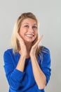 Woman expressing herself with hands and toothy smile