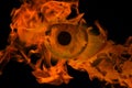 Woman eye with burning fire in it Royalty Free Stock Photo