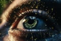 a woman eye closeup with golden lights lights particles on eyelashes, dark background, beauty concept Royalty Free Stock Photo